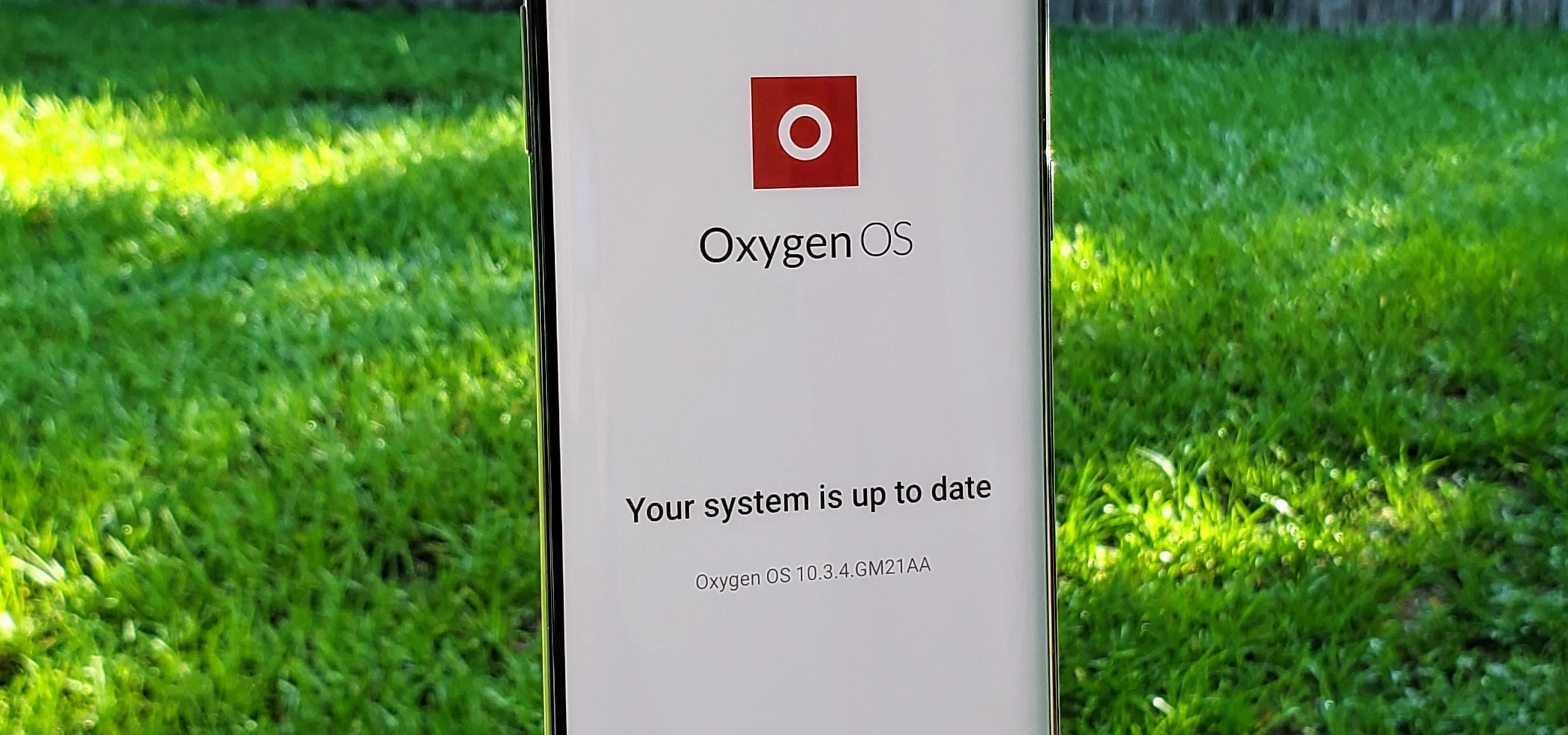 OxygenOS system update confirmation on a smartphone.