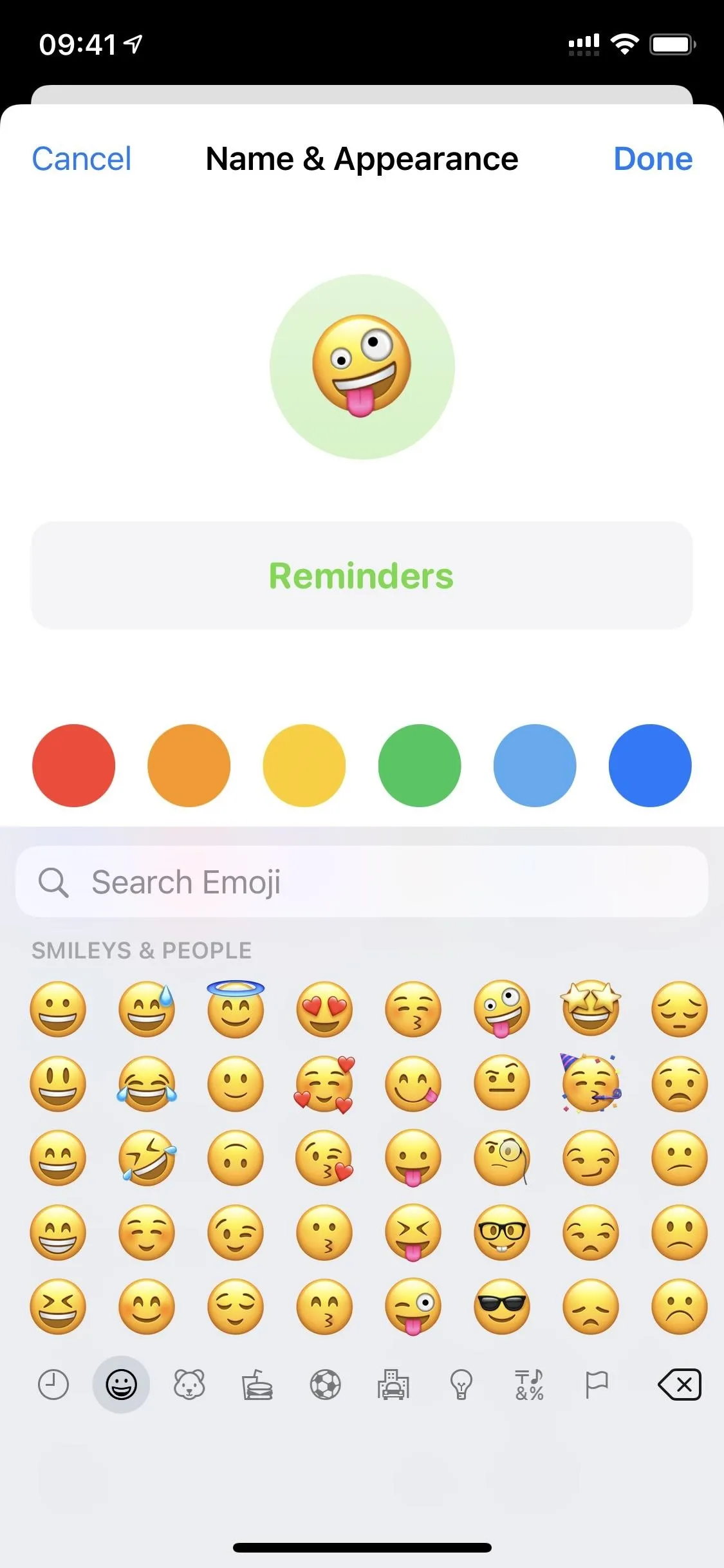 Emoji selection interface with various smiley emojis.