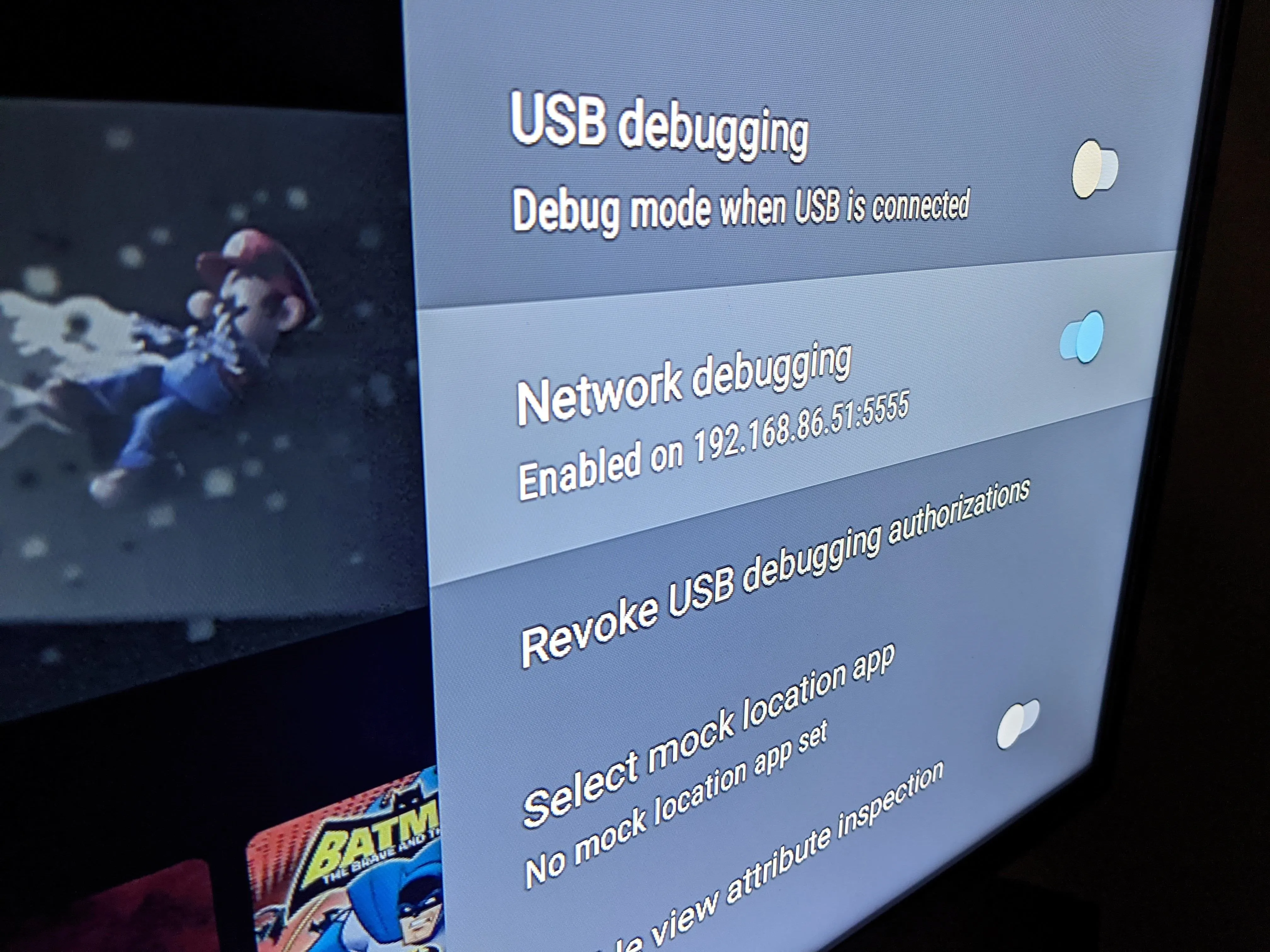 USB debugging settings on a device screen.