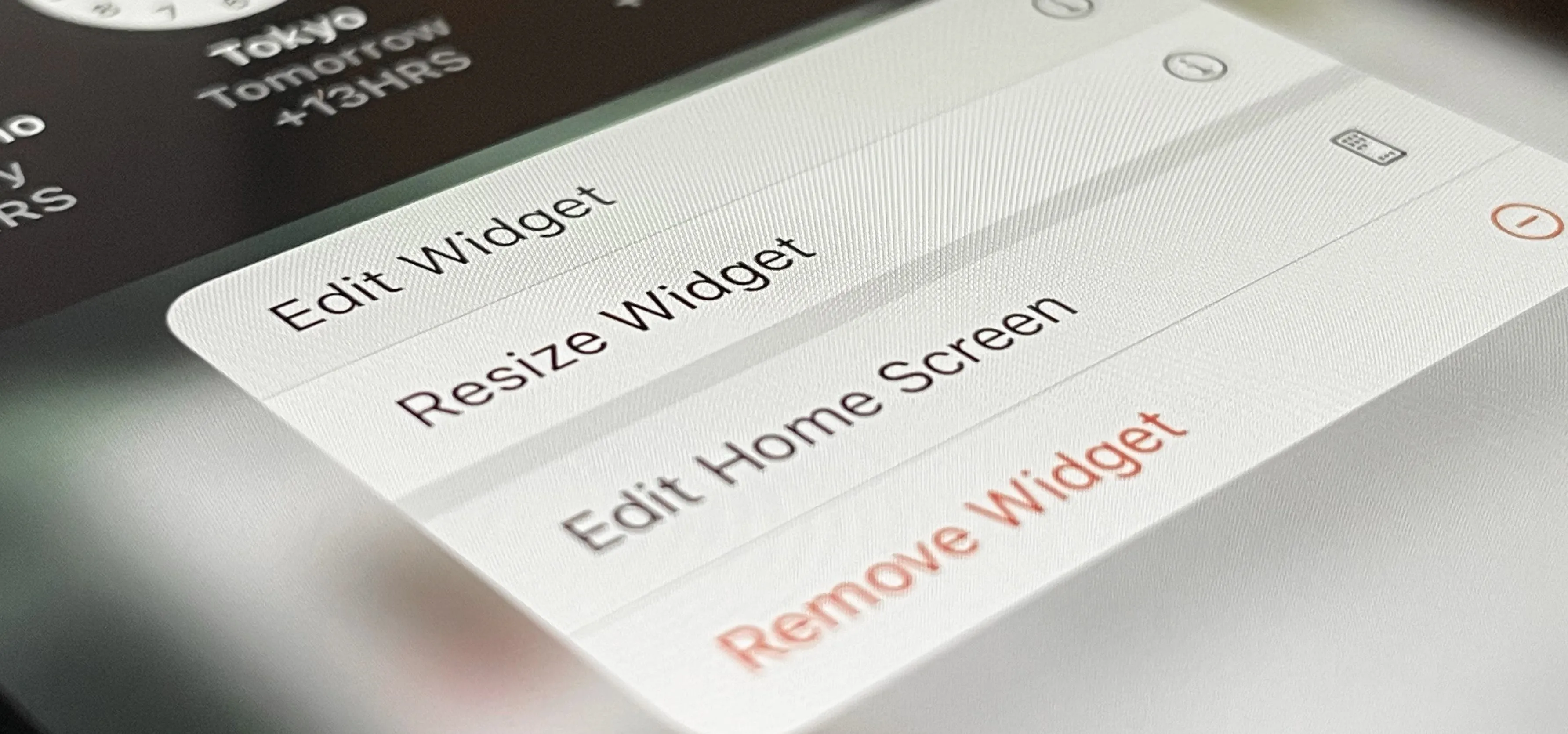 Widget editing options on a mobile device screen.