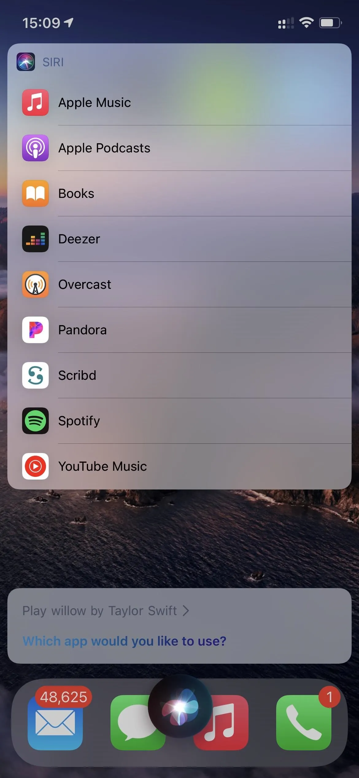 Smartphone screen displaying various app icons including Apple Music, Netflix, and Spotify.