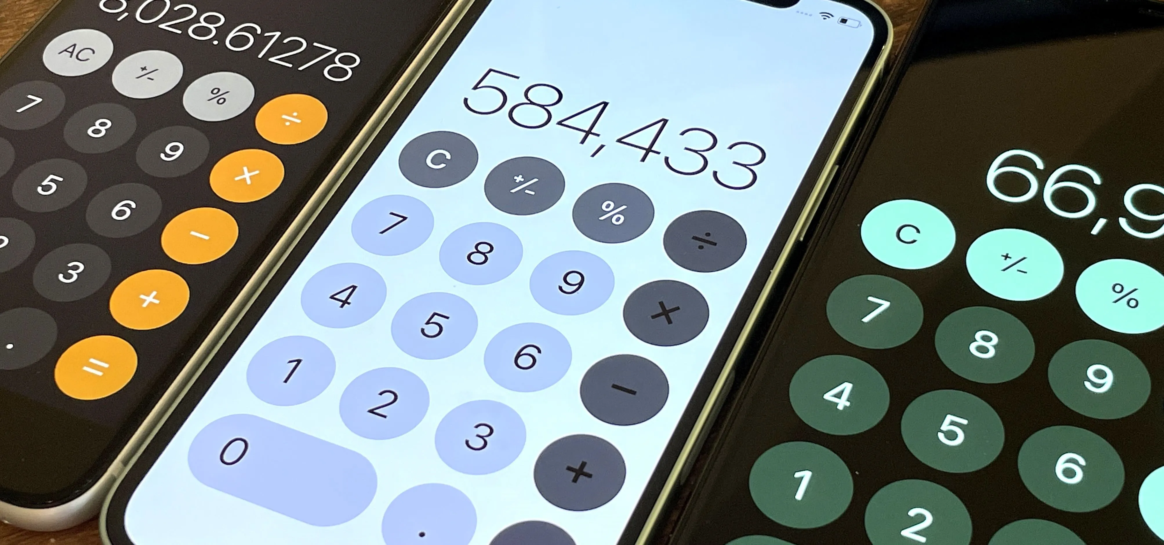 Calculator apps displayed on smartphones showing various calculations.