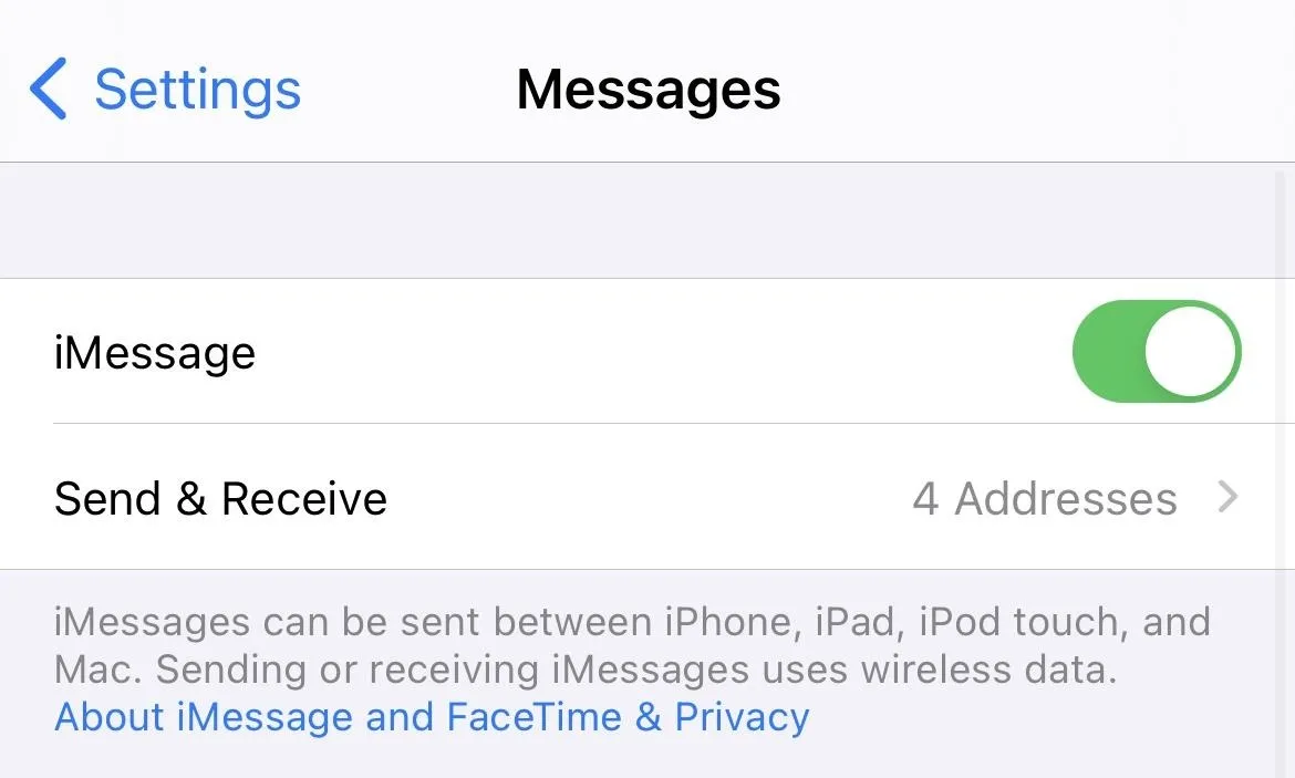 Settings screen showing iMessage toggle and Send & Receive options on an iPhone.