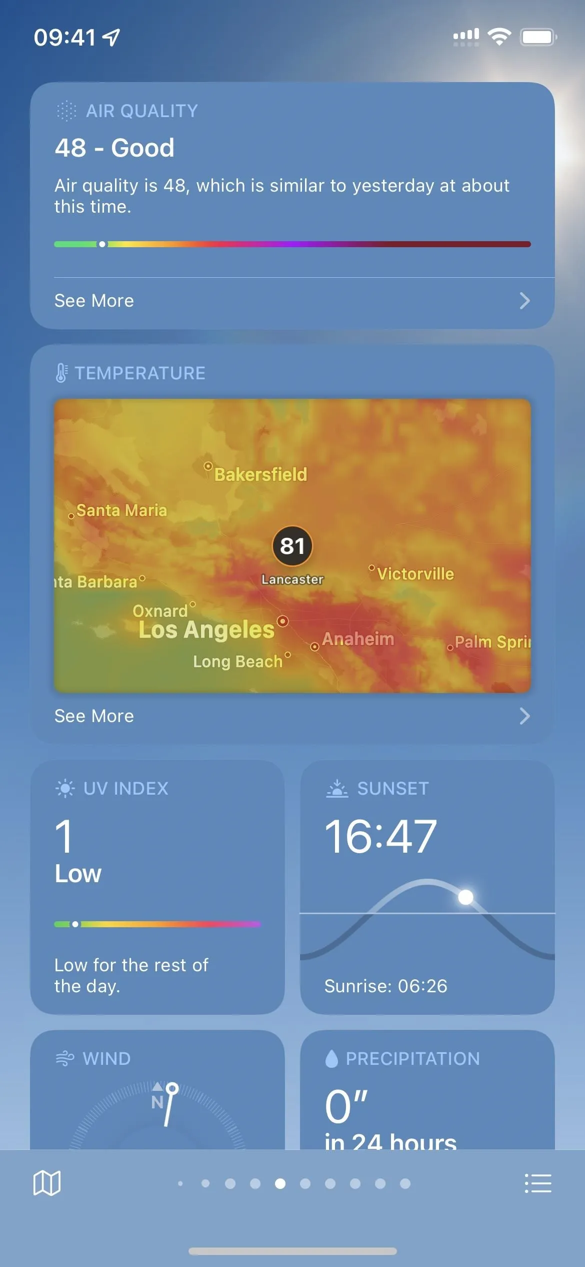 Weather forecast display showing temperature, location, and atmospheric conditions.