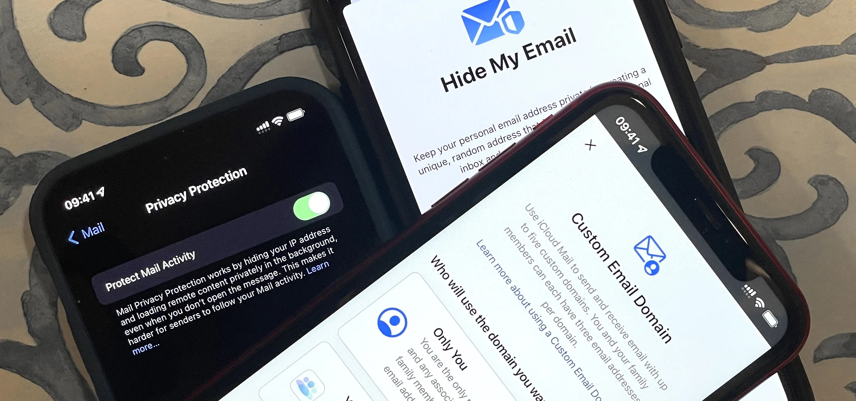 Smartphones displaying email privacy settings on their screens.