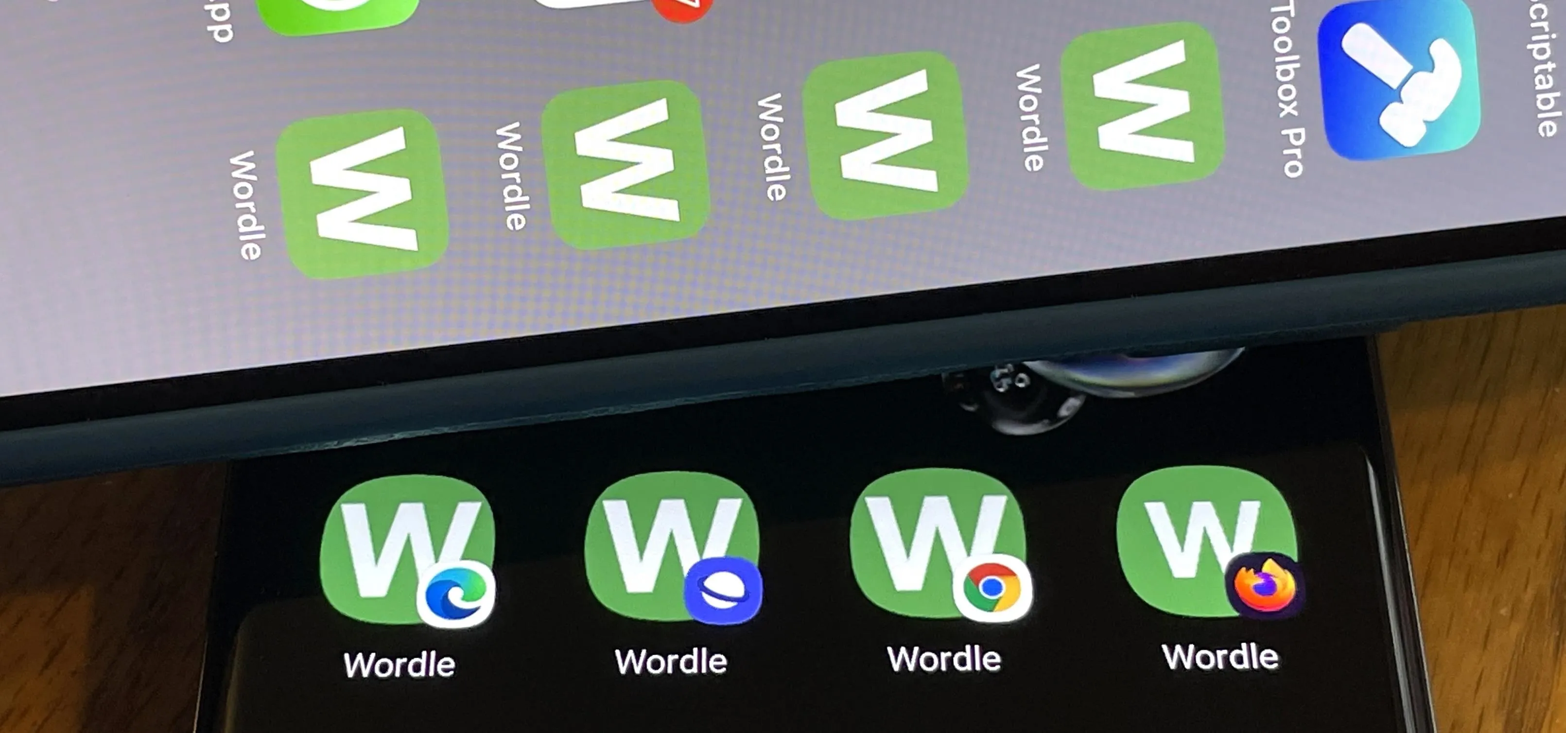 Various Wordle app icons displayed on smartphone screens.