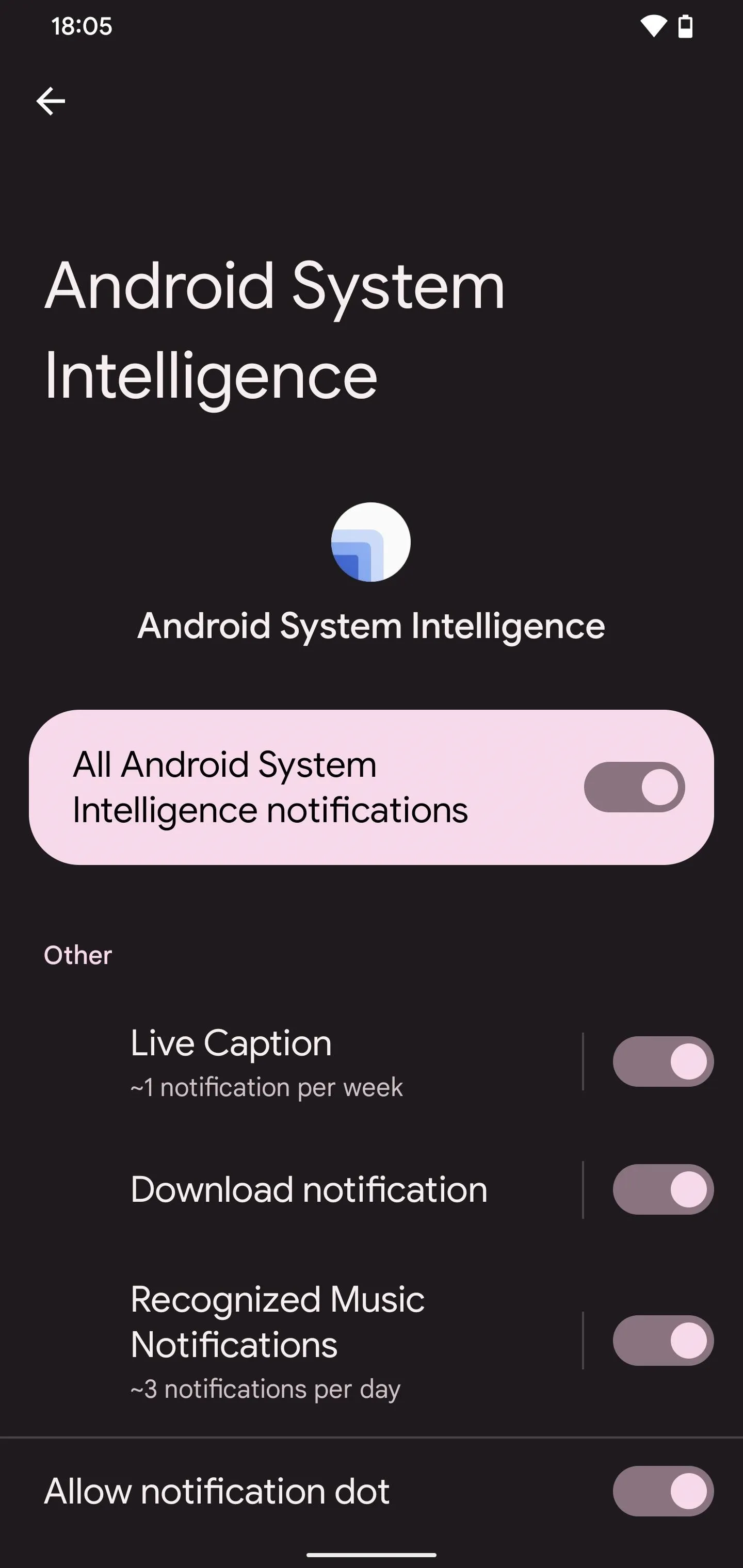 Android System Intelligence settings screen with options for Live Caption, Download notification, and Recognized Music notifications.