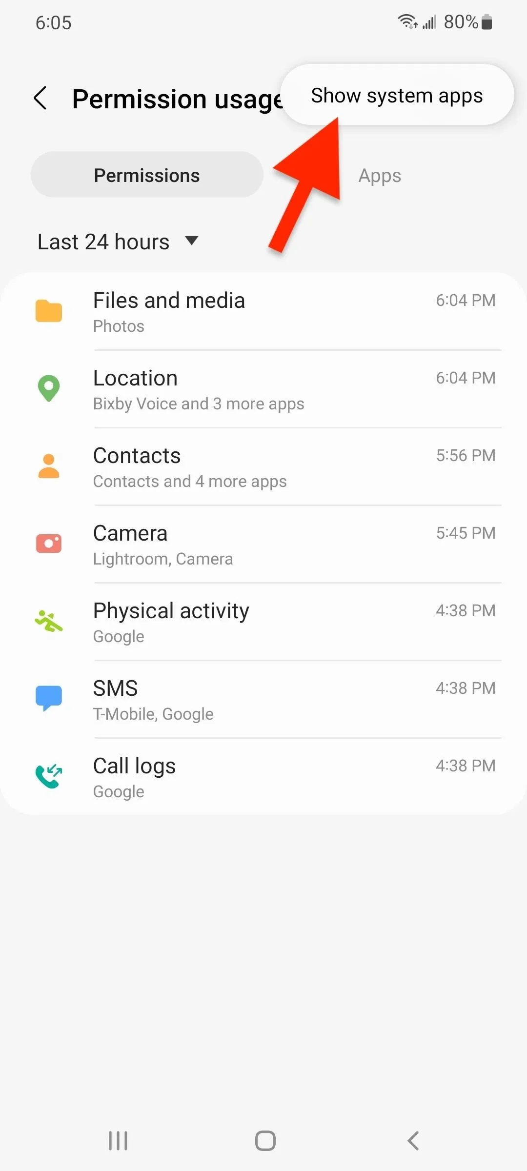 Permission usage settings on a mobile device with an indicator arrow pointing to "Show system apps."