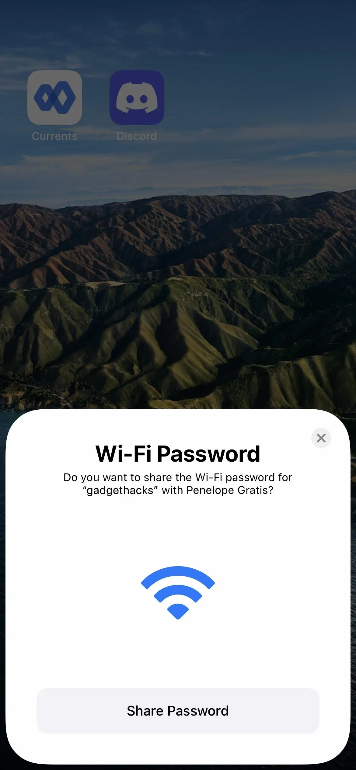 Wi-Fi password entry interface on a mobile device with a scenic background.