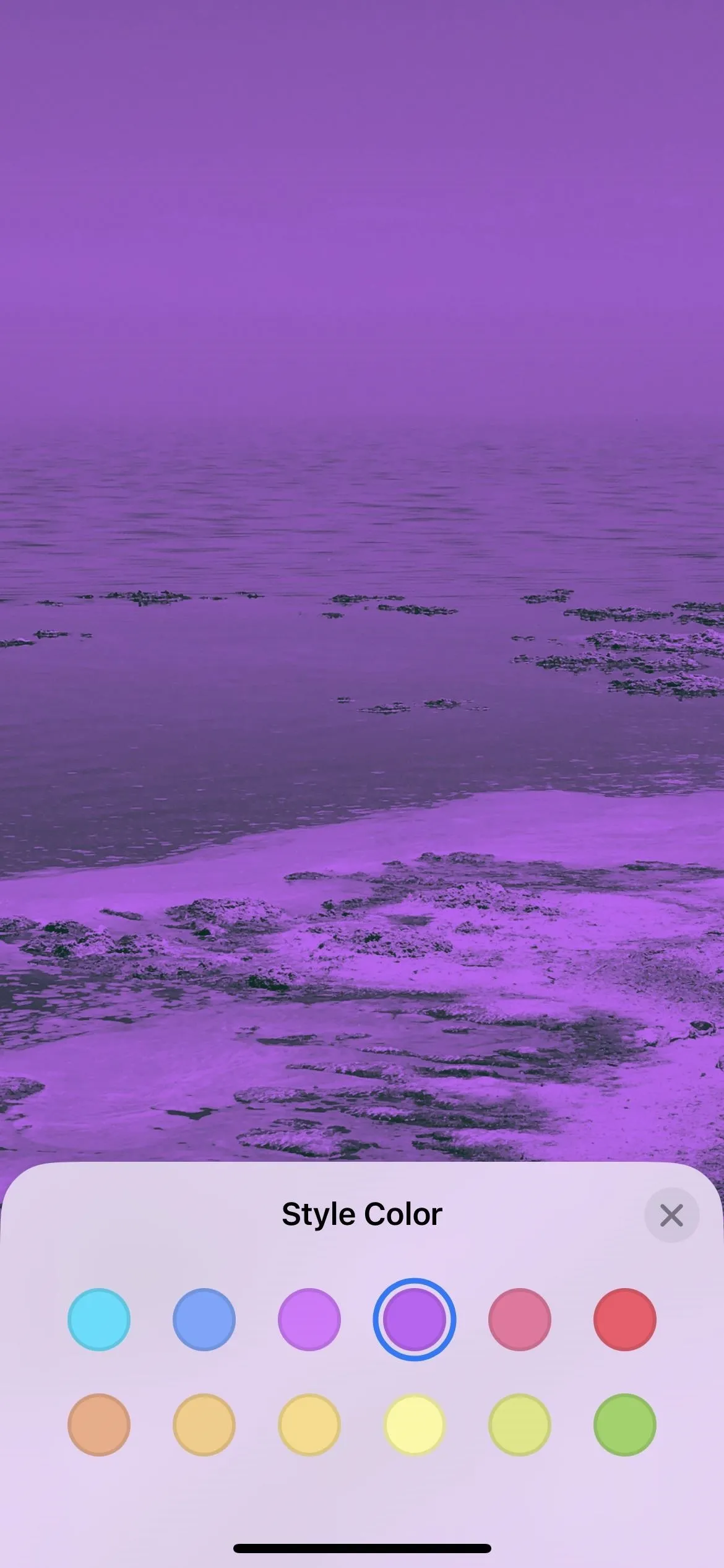 Purple ocean view with color palette options below.