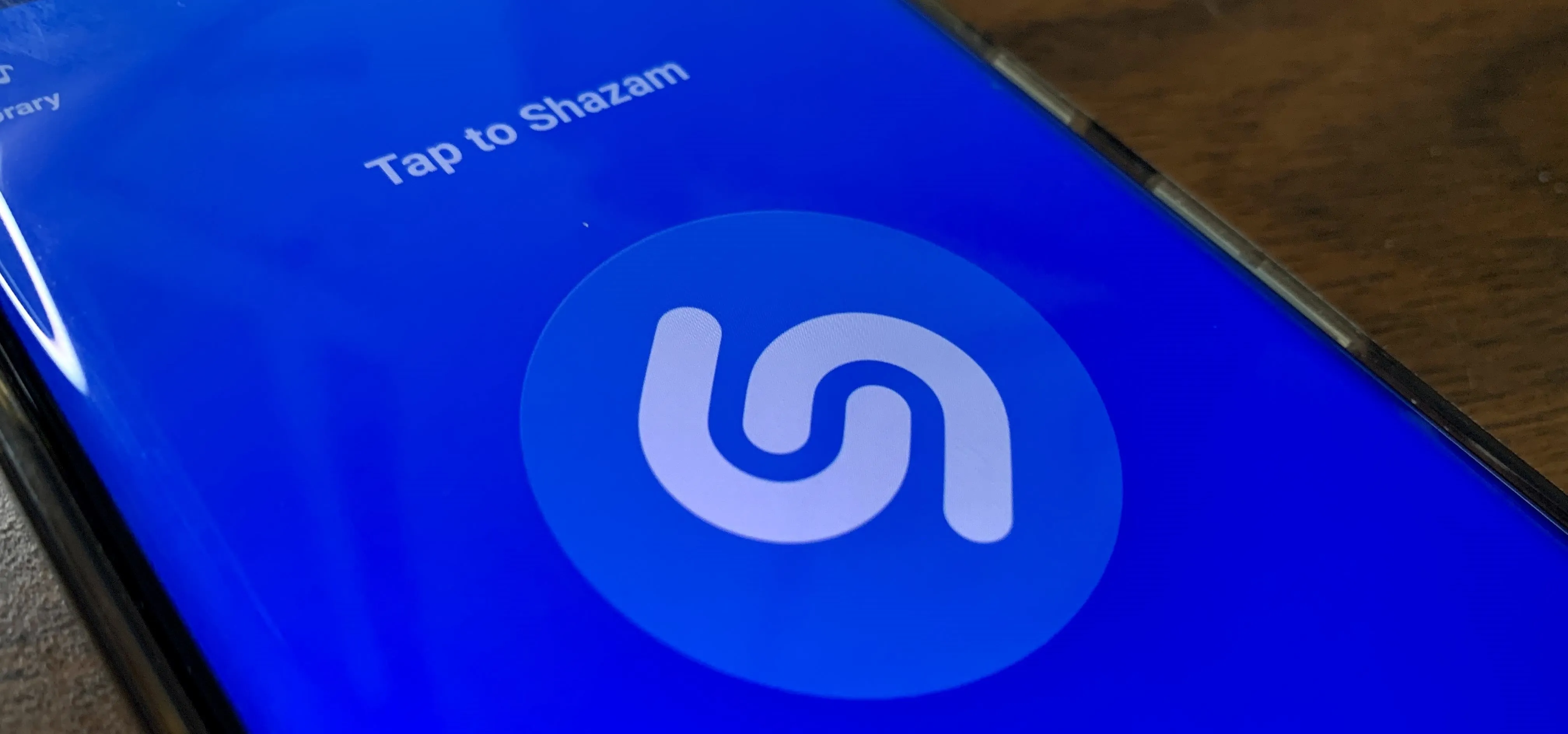 Shazam app interface with "Tap to Shazam" prompt