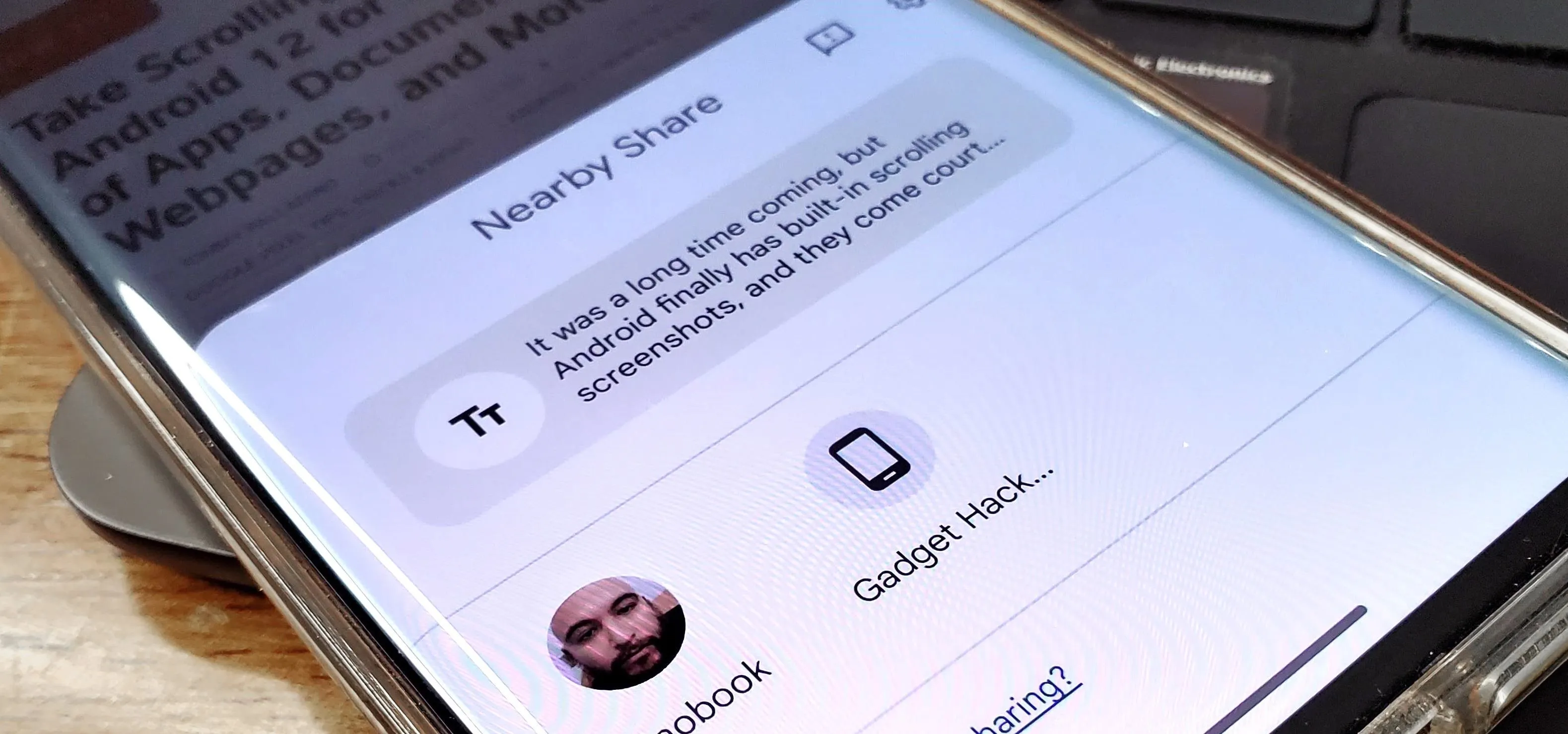 Smartphone displaying a sharing interface with options for Nearby Share and Facebook.