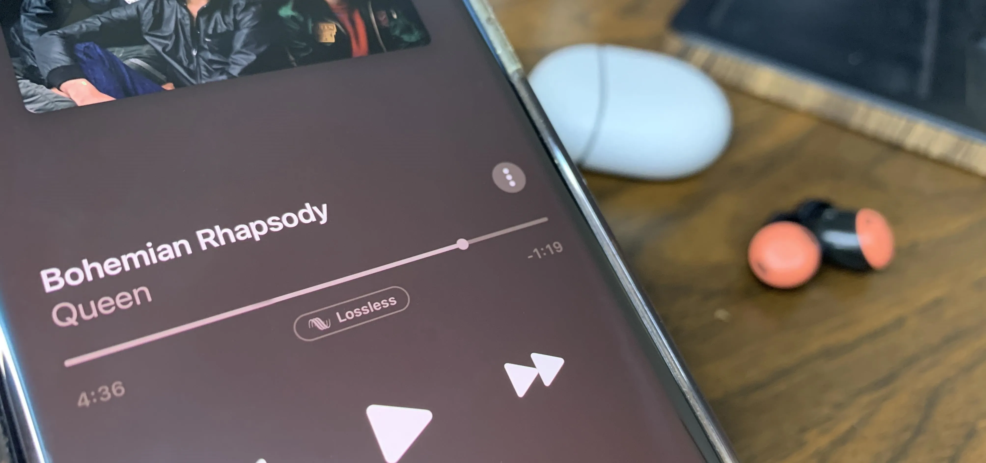 Smartphone displaying "Bohemian Rhapsody" by Queen on a music streaming app.