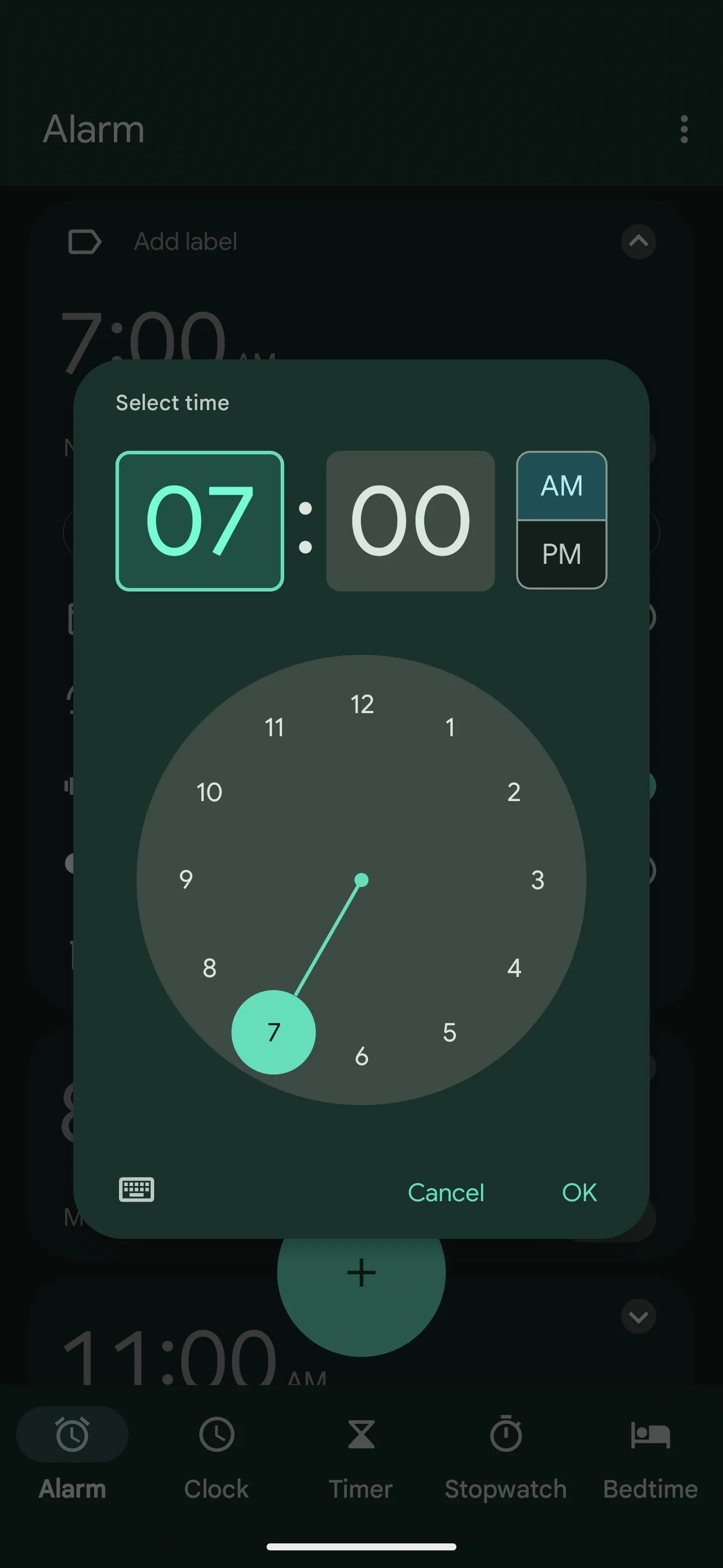 Digital clock displaying 7:00 AM alarm time.