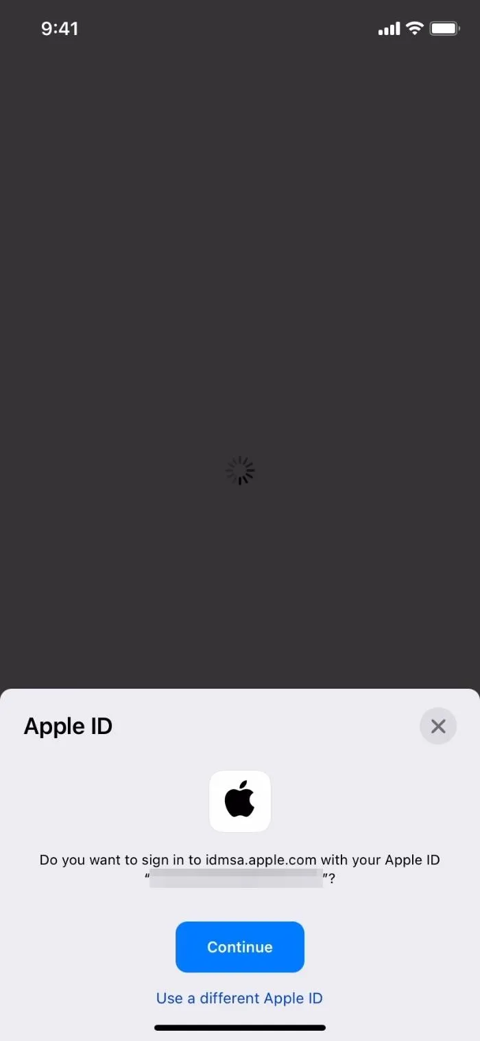 Apple ID login screen with options to sign in or create an account.