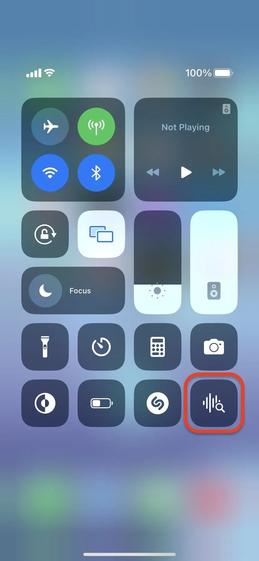 Control Center interface on a smartphone showing various settings icons.