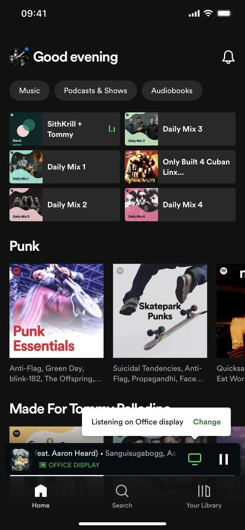 Music streaming app interface displaying playlists and songs.