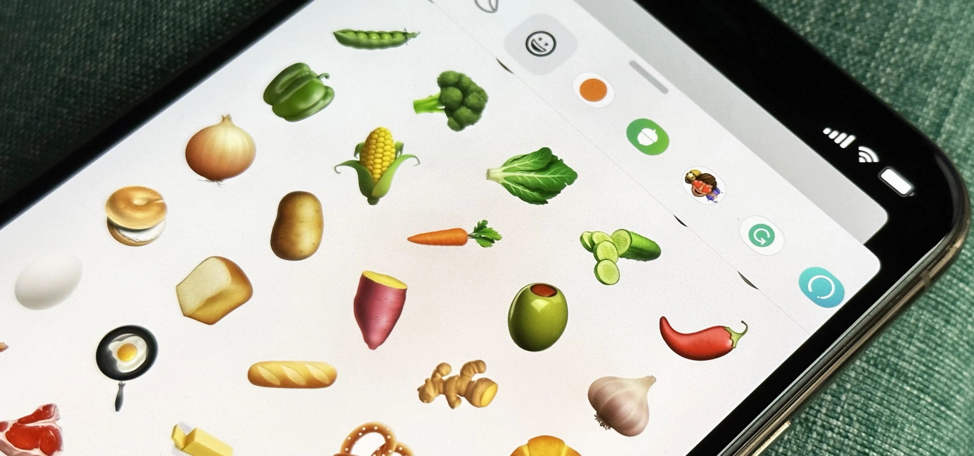 A smartphone display showing various food emojis.