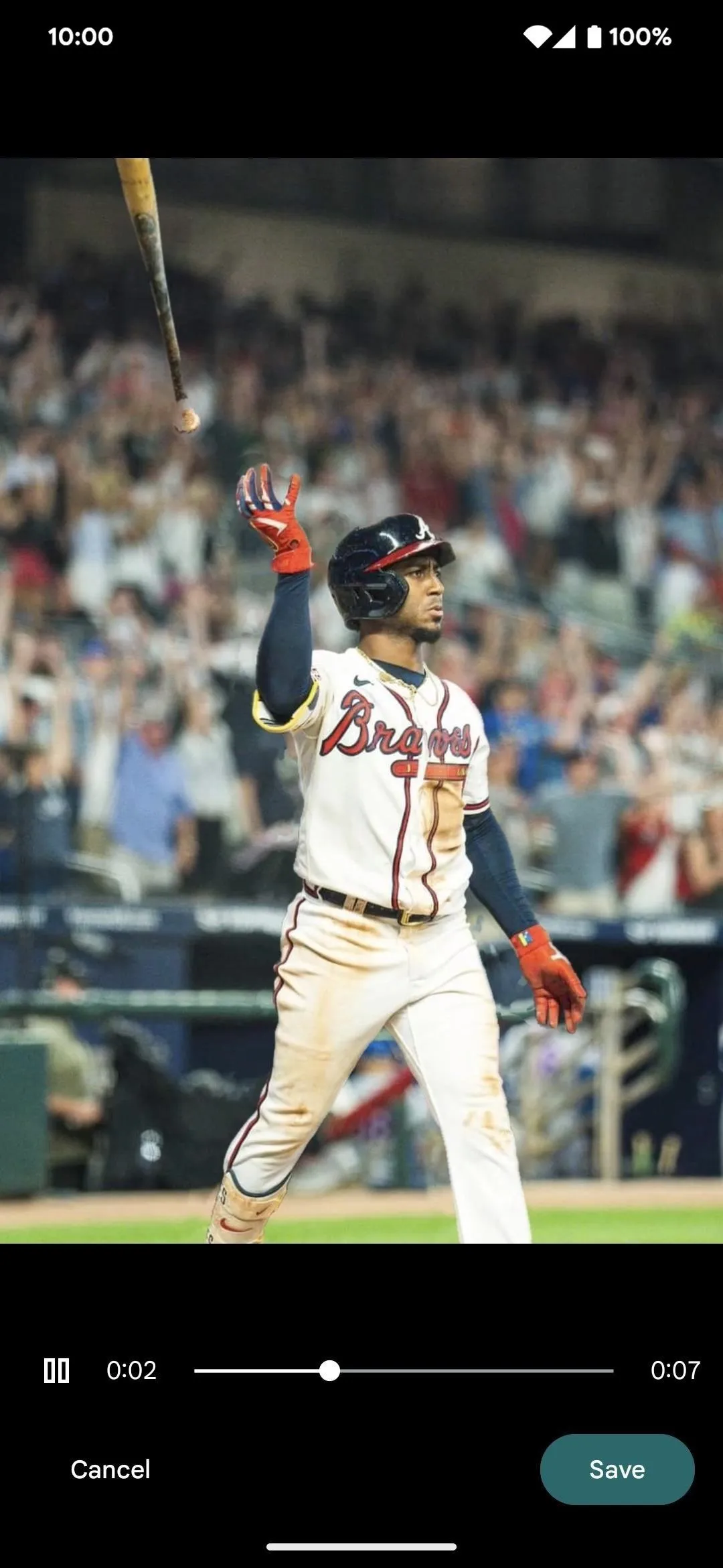 Baseball player celebrating a home run.