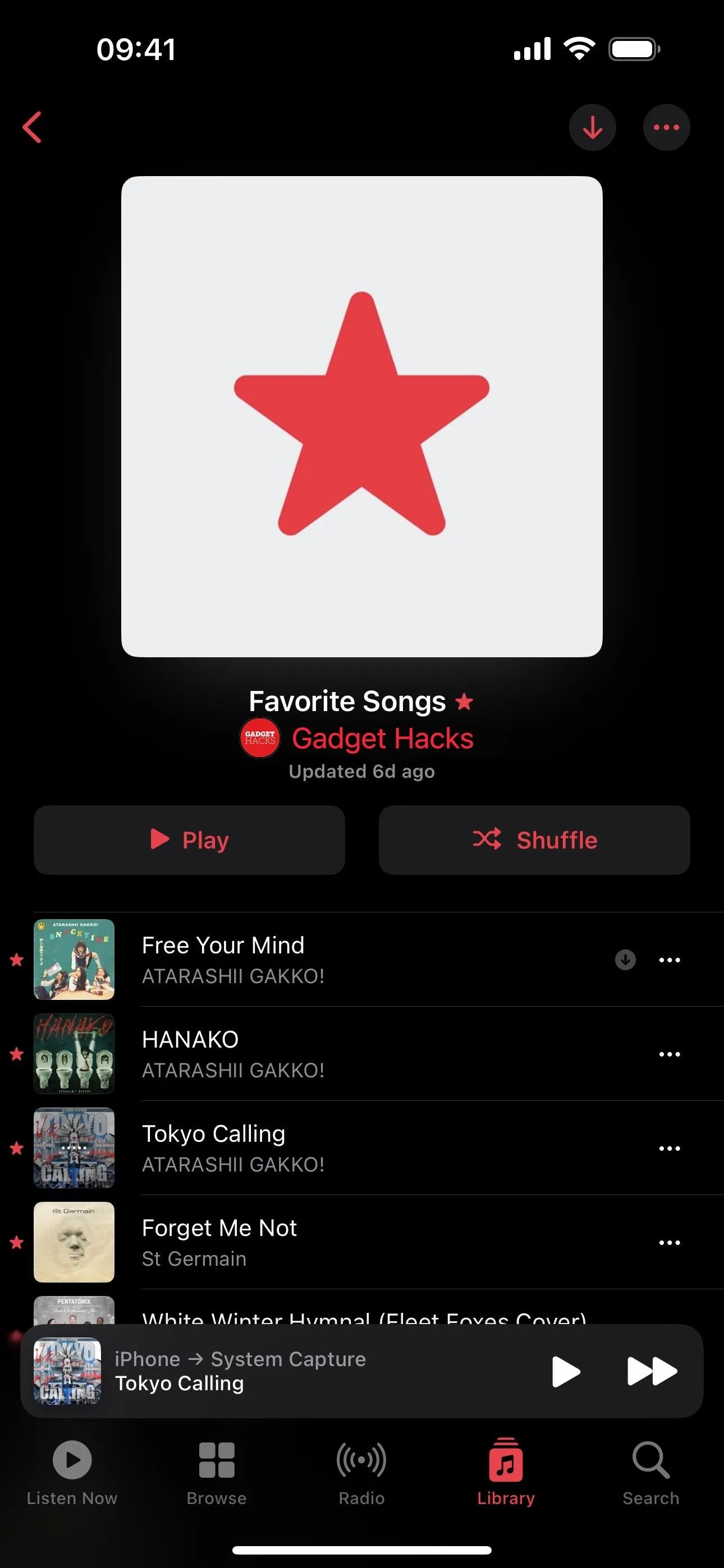 Music playlist with a red star icon on a dark background.