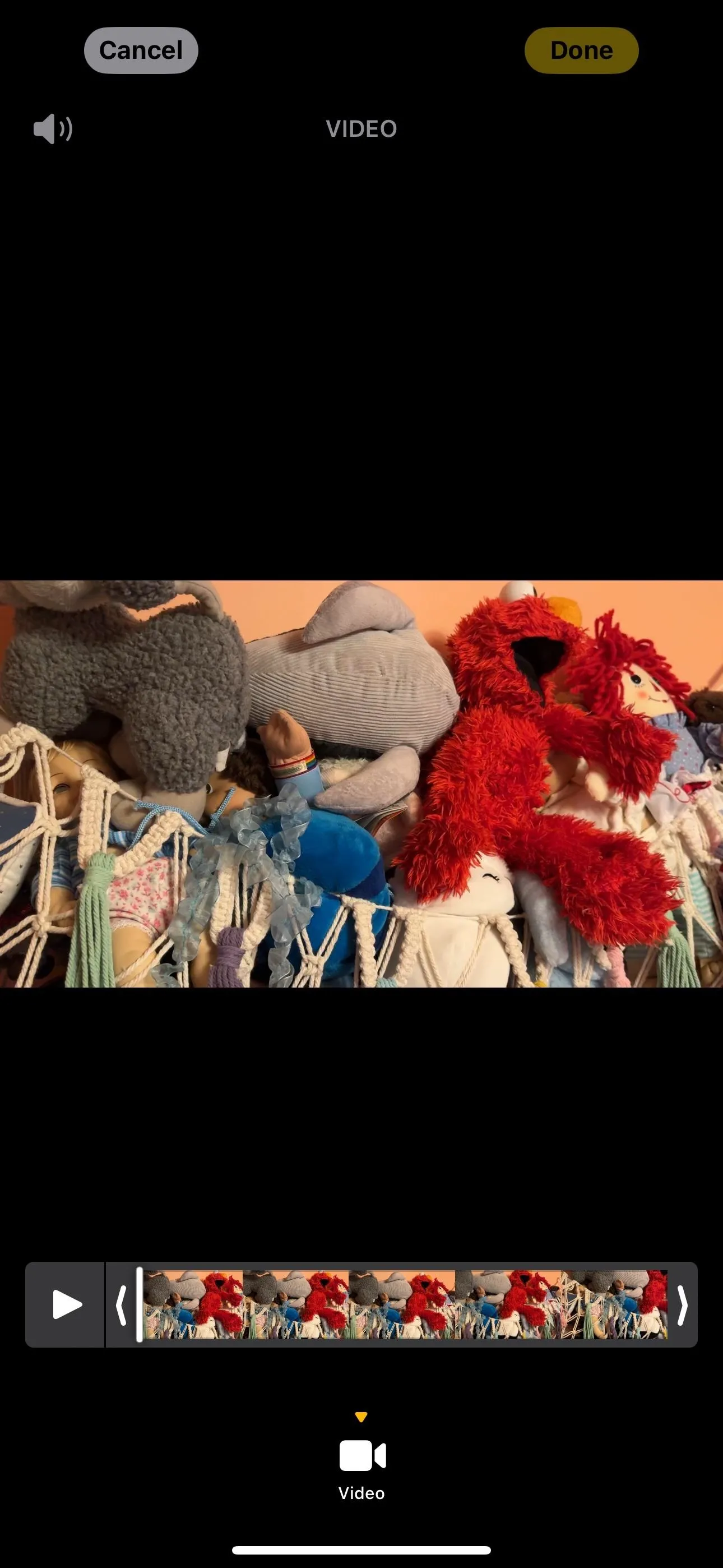 Stuffed animals displayed on a colorful blanket.