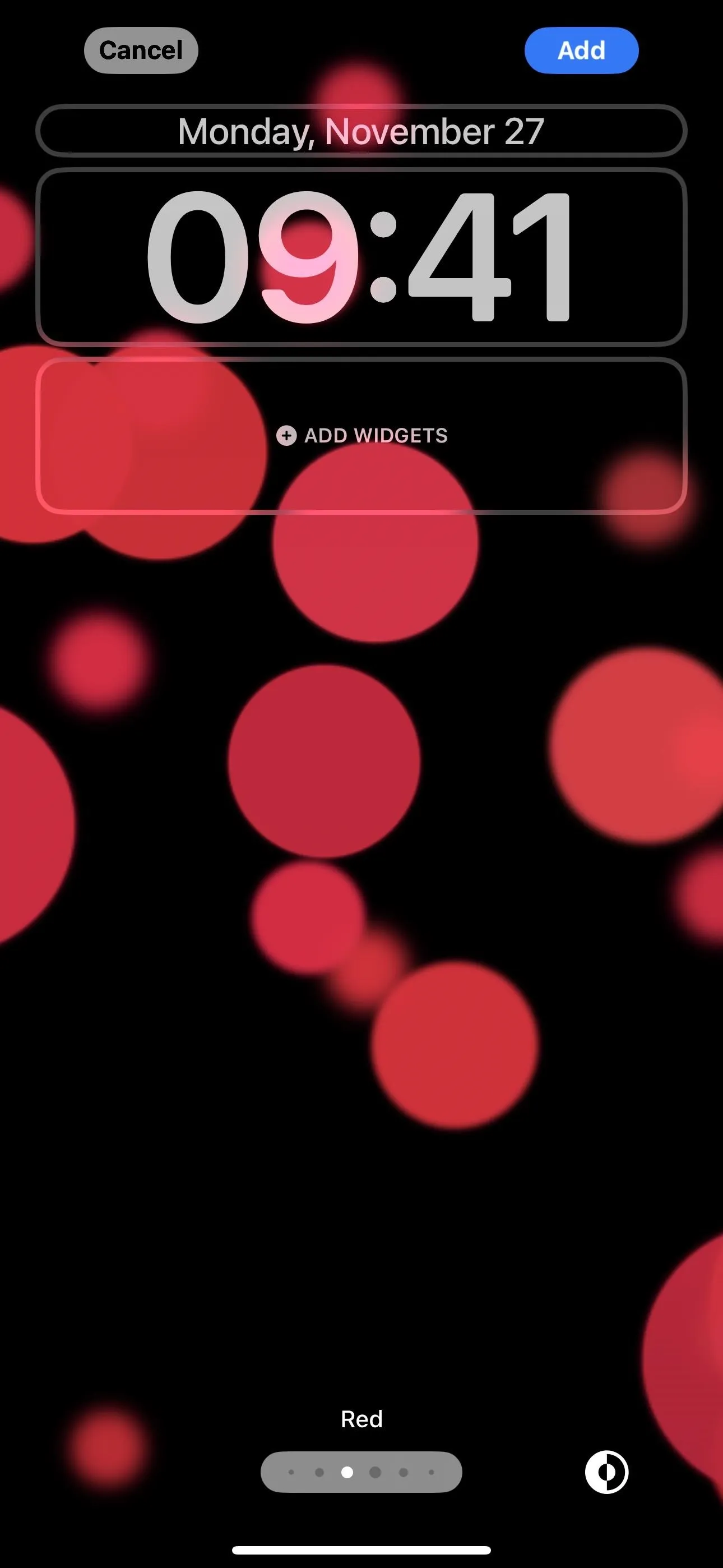 Abstract background with red circular shapes on a black screen showing the time 09:41.