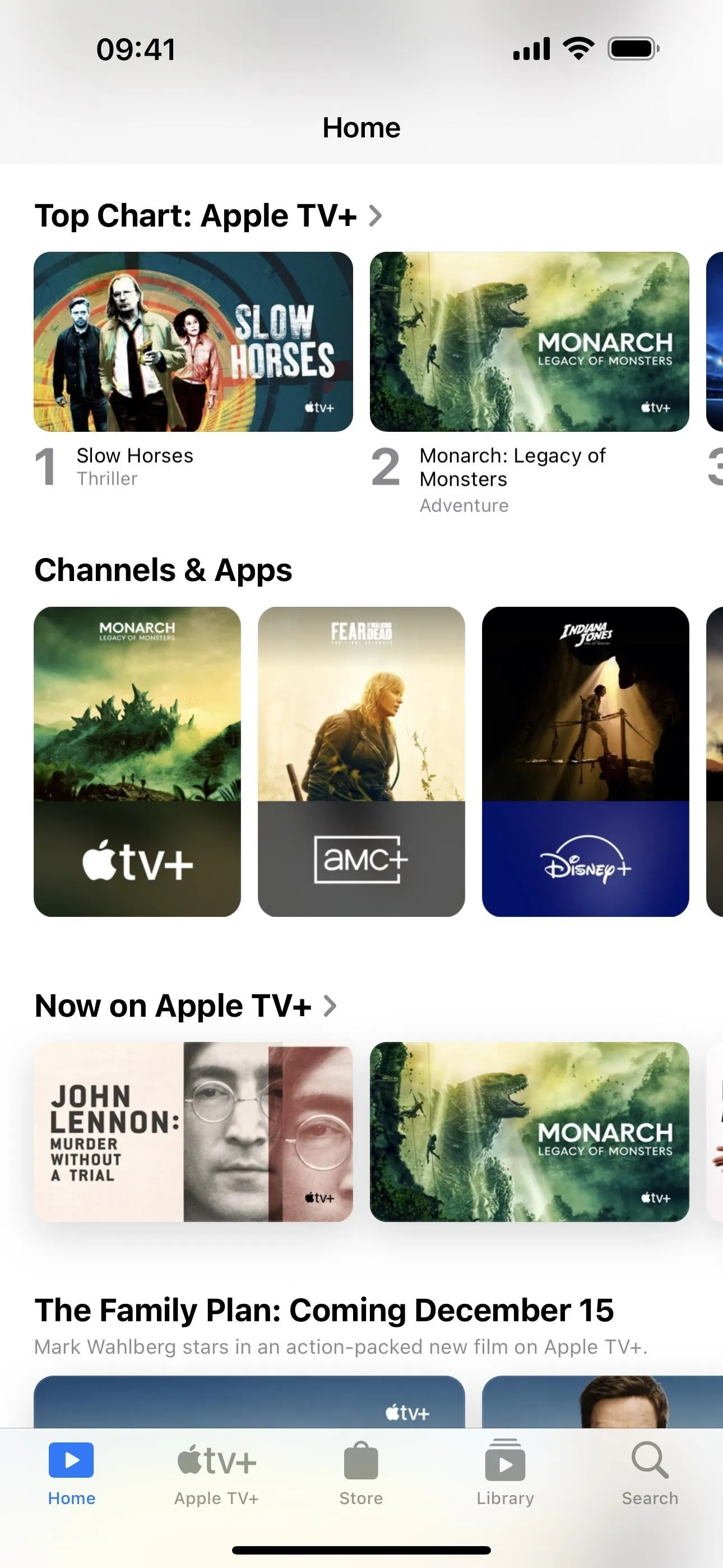 Apple TV app showcasing top charts, channels, and upcoming content.