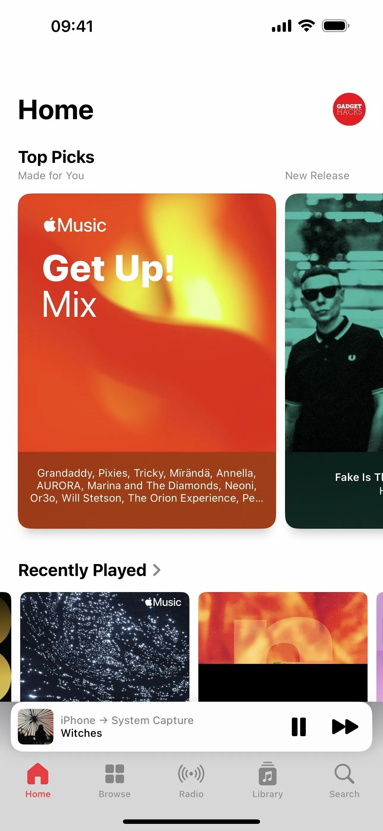 Apple Music app interface showcasing the "Get Up! Mix" playlist.