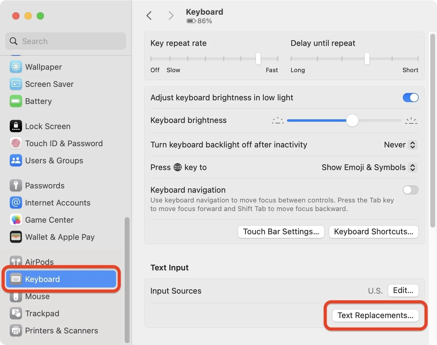 Keyboard settings interface with options for adjusting brightness and text replacements.