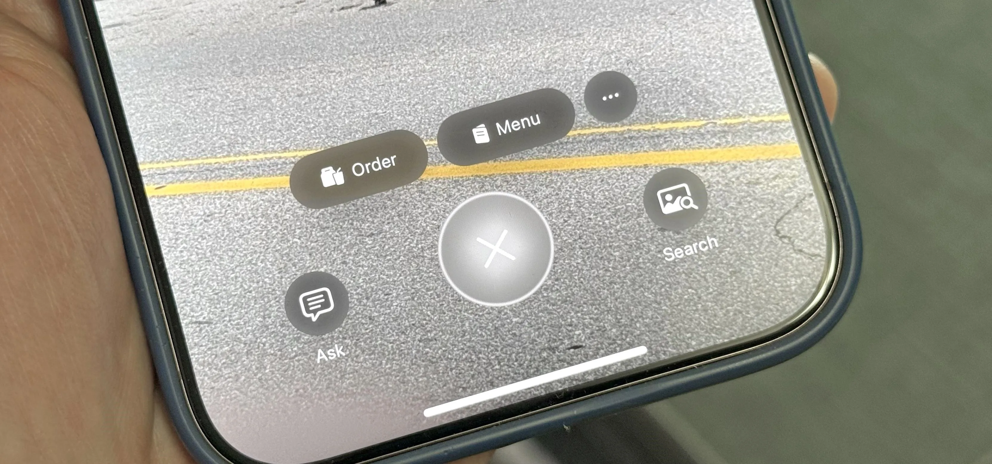 A close-up view of a smartphone screen displaying camera controls and options.