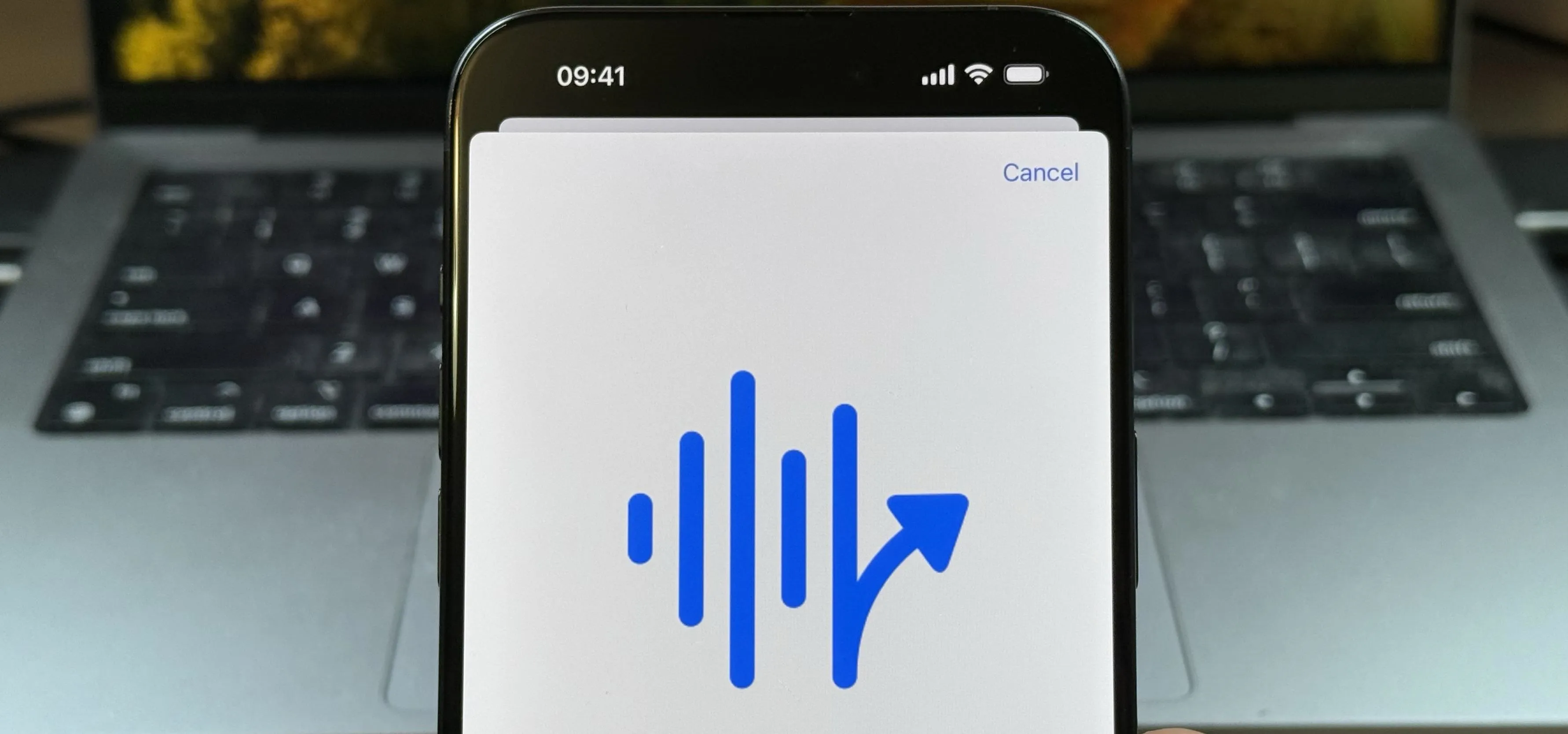 Sound wave symbol with an upward trend on a smartphone screen.