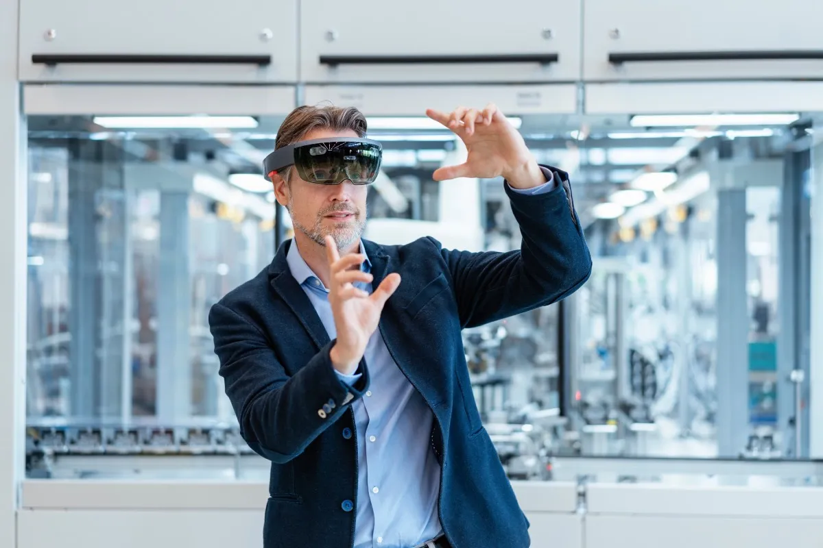 businessman-wearing-ar-glasses-in-a-modern-factory-2024-09-15-17-28-58-utc-2.jpg