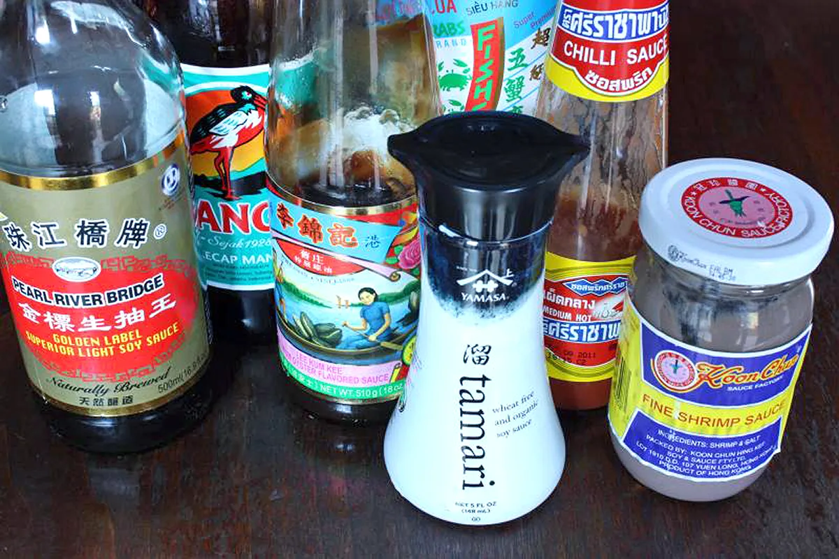 null Variety of Asian sauces and condiments in bottles.