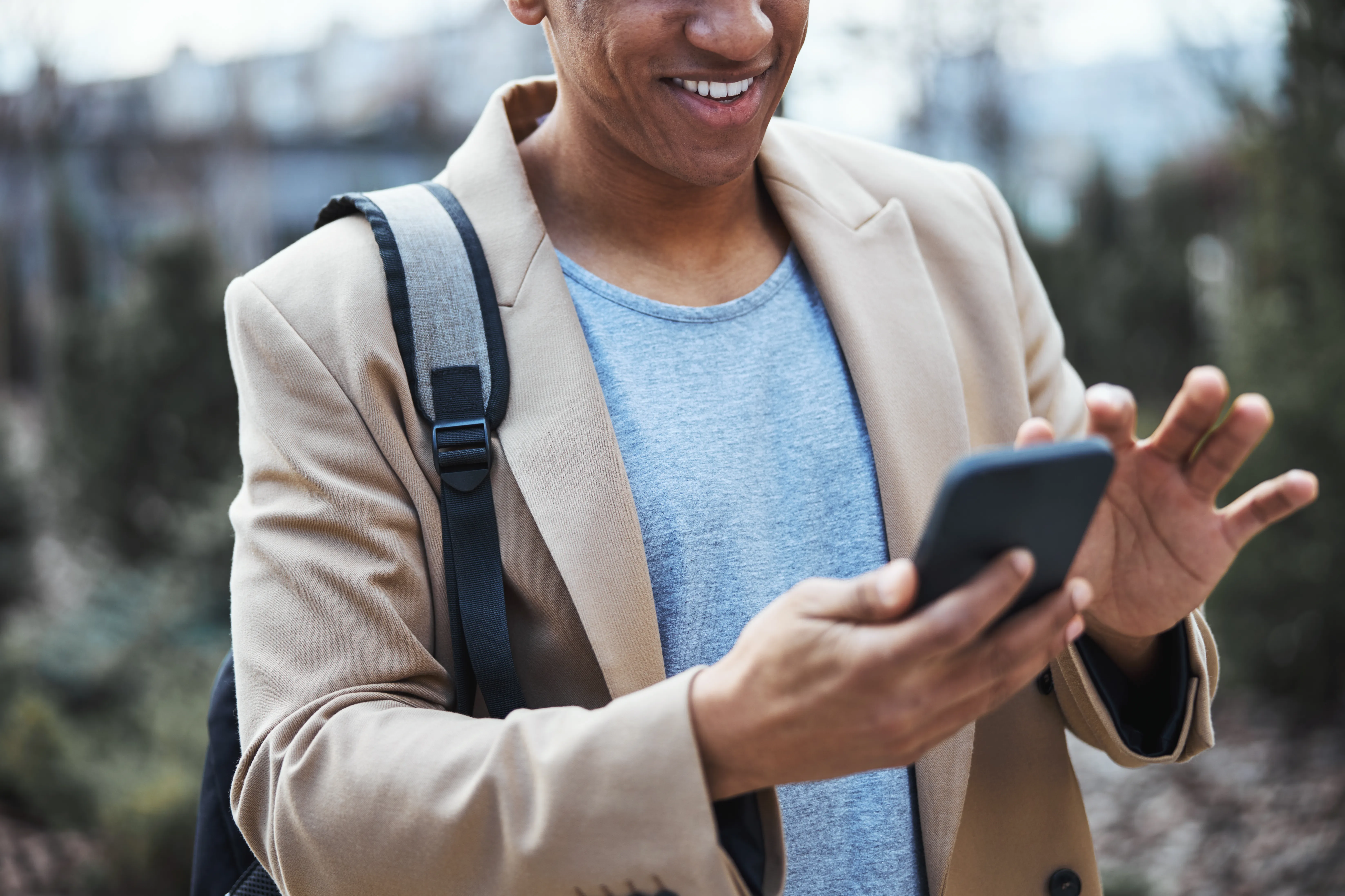 image of someone using their smartphone to text