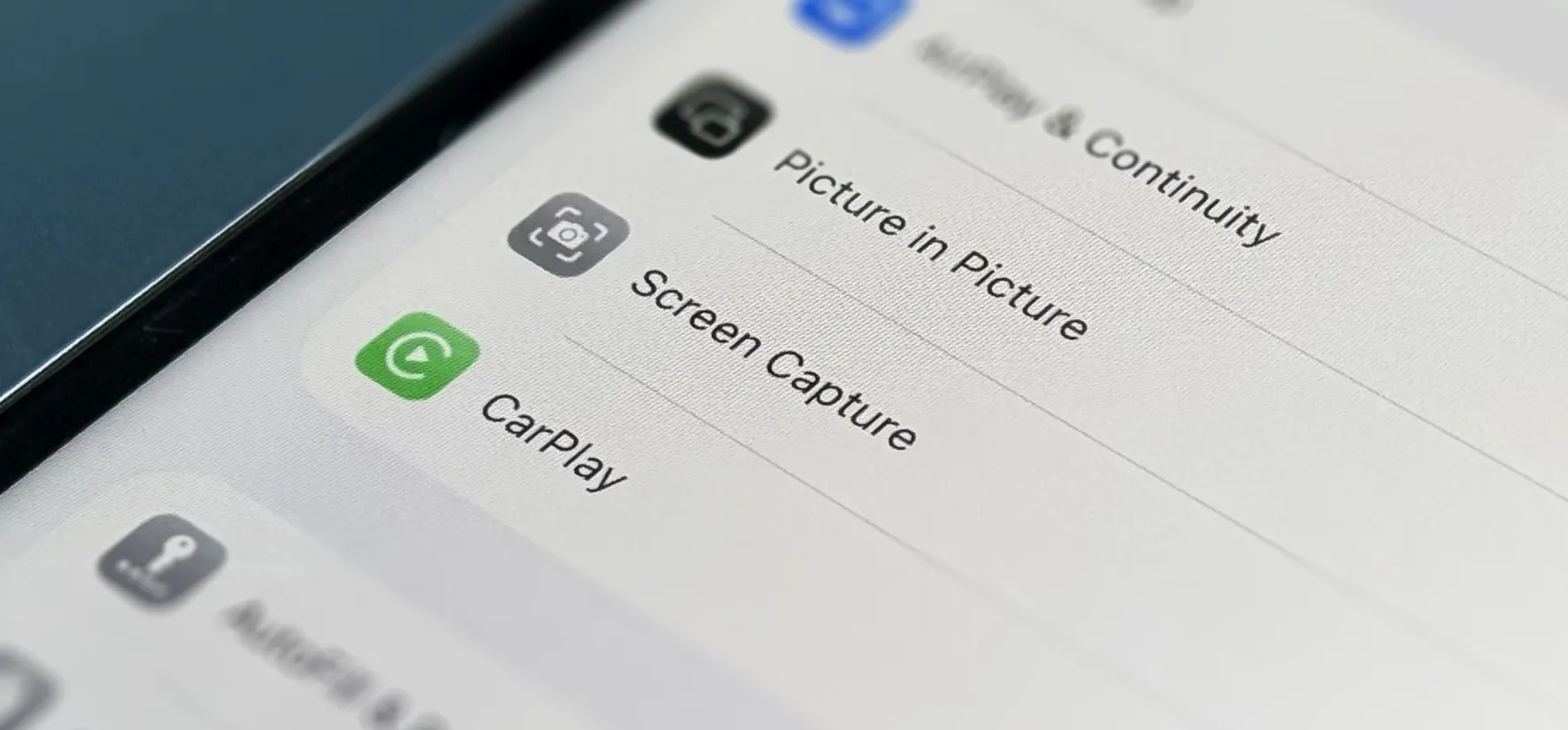 iPhone Settings menu highlighting Screen Capture option between Picture in Picture and CarPlay rows on white background, demonstrating new screen recording feature.