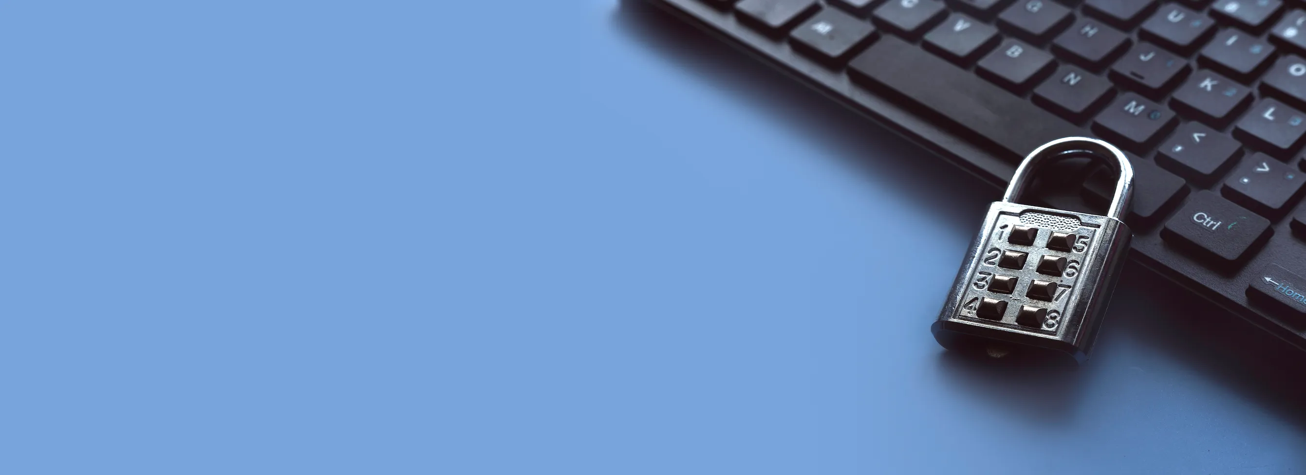 lock-and-keyboard-on-blue-background-2026-01-06-11-00-38-utc.png