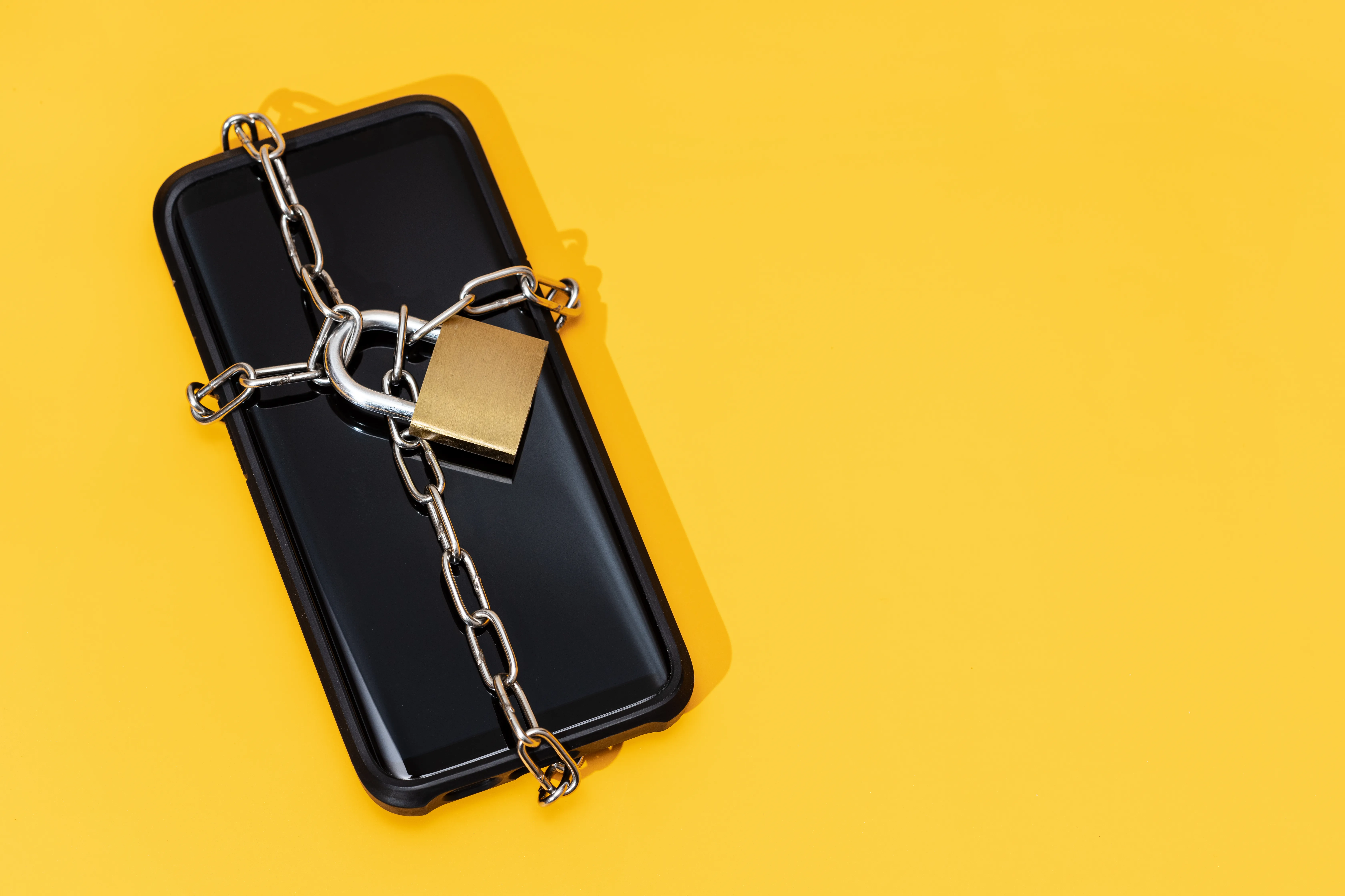 image of a phone with a chain and lock