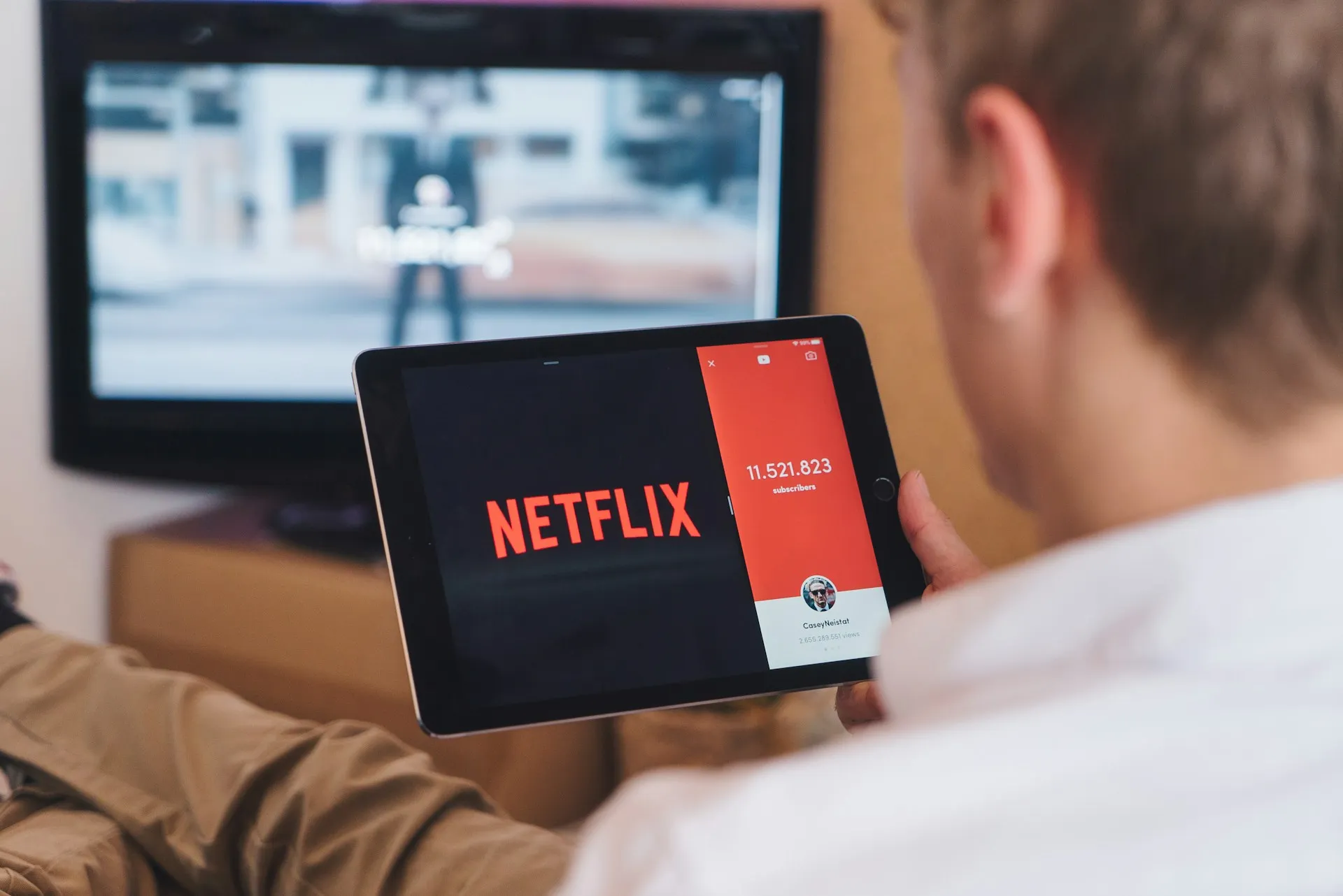 image of someone using their tablet to watch netflix
