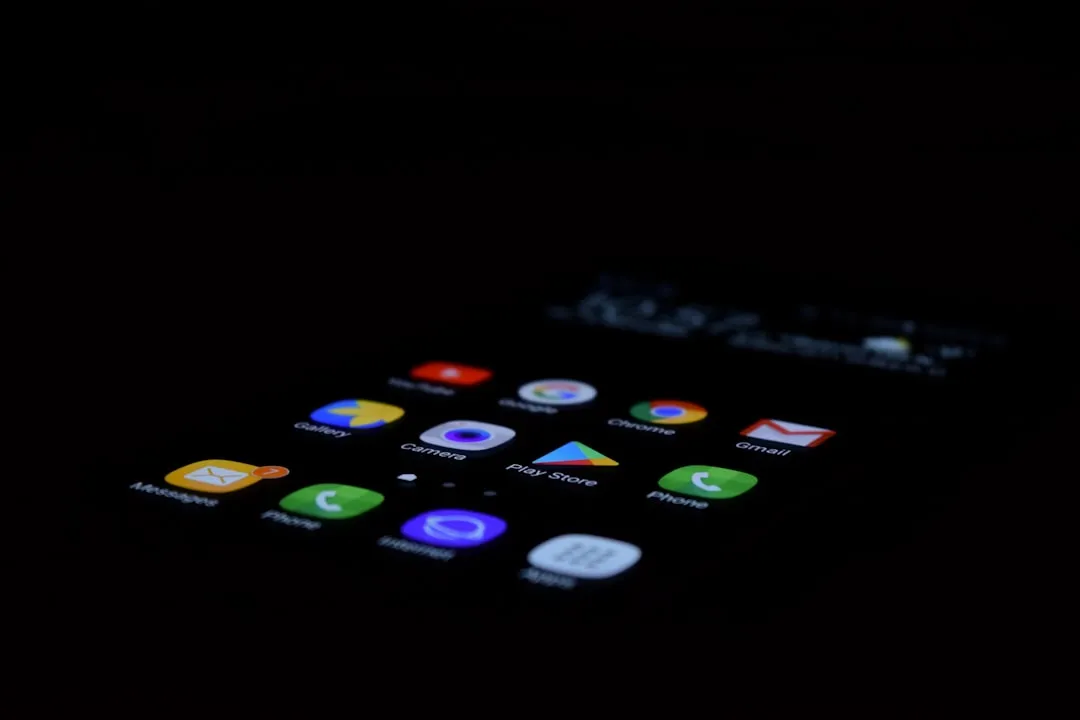 Verizon and AT&T mobile carrier logos with a smartphone displaying a security alert.