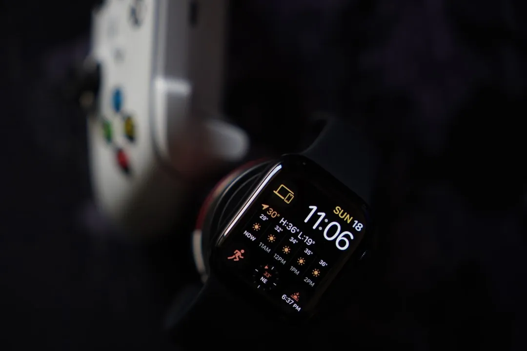 Smartphone displaying the time, weather, and home screen apps.