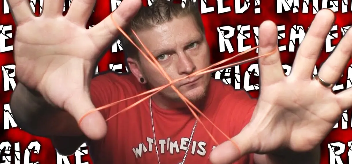 Man performing a magic trick with string and hands, with repeating "REVEALED! MAGIC" text in the background.