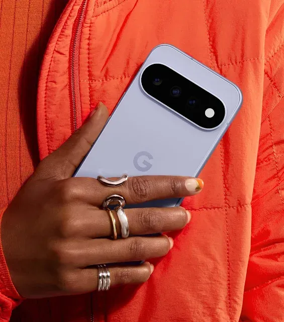 Person holding a Google Pixel 11, illustrating the Pixel 11 September update and its latest software changes