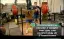 Weightlifting training session with a person preparing for a squat.