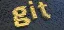 3D text design of the word "bit" in gold blocks on a textured background.