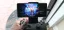 Mobile gaming setup with a controller and a smartphone displaying a game.