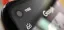 Close-up of a smartphone displaying the time and app icons.
