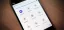 Smartphone displaying a user interface with various app icons and settings options.