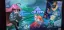 Illustration of characters from the game "Celeste" against a colorful backdrop.