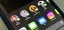 App icons and contact profiles on a smartphone screen.