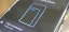 Smartphone displaying resolution settings on a dark background.
